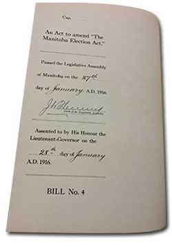 Photo of a page in Bill No. 4. An act to ammend The Manitoba Election Act. “Passed the Legislative Assembly of Manitoba on the 27th day of January AD 1916.” Signed by Clerk of the Legislative Assembly. “Assented to by His Honour the Lieutenant-Governor on the 28th day of January A.D. 1916. BILL No. 4”