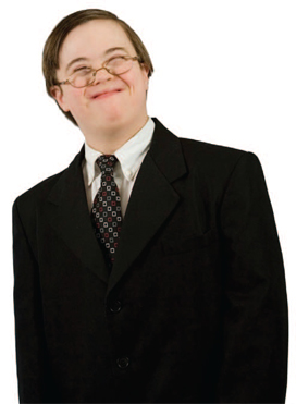 child in a suit smiling