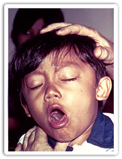 Difficulty of breathing in a young boy with diphtheria