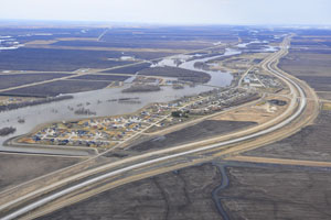 Aerial image of flooding outside of the Ste. Agathe ring dike, 2011