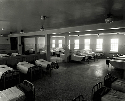 empty beds in an institutional ward
